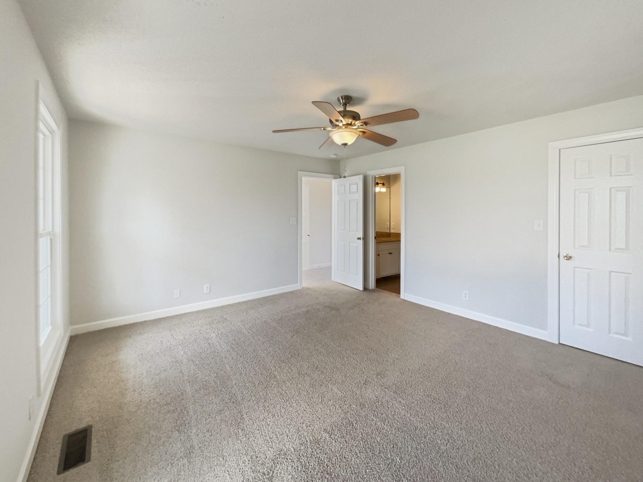 1683 South Walker Road Pleasant View, TN 37146 - Photo 5 of 26 a view of an empty room with a window