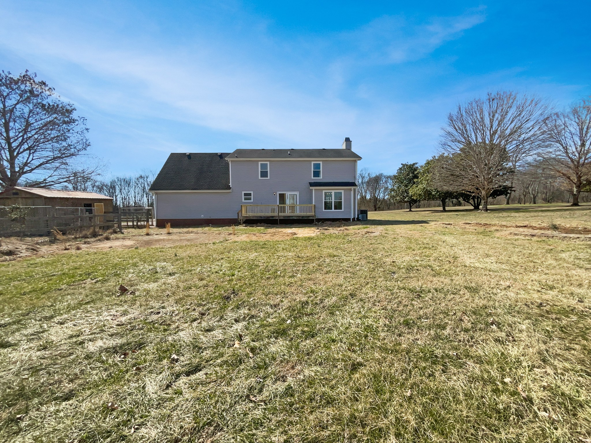1683 South Walker Road Pleasant View, TN 37146 - Photo 8 of 26 a big room with lots of trees
