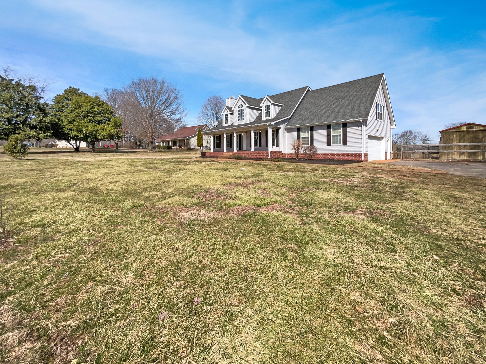 1683 South Walker Road Pleasant View, TN 37146 - Photo 9 of 26 a view of a house with a yard from a balcony