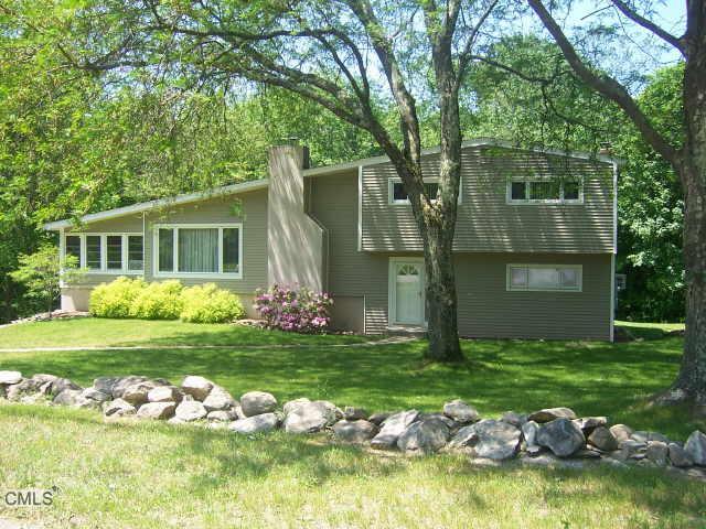 10 High Ridge Road Brookfield, CT 06804 - Photo 1 of 1 a view of a house with swimming pool and a yard