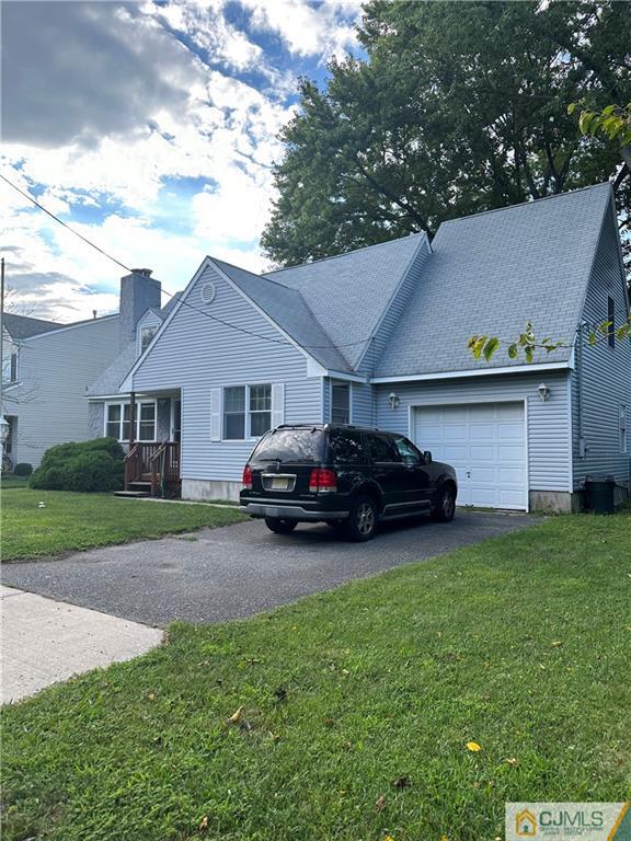 a house view with a garden space