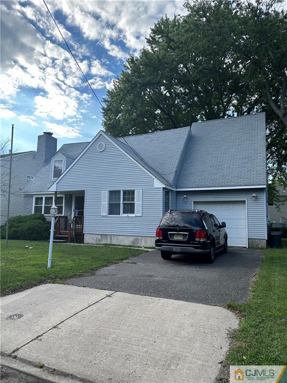 3131 Powhatan Avenue Point Pleasant, NJ 08742 - Photo 2 of 2 front view of a house with a yard