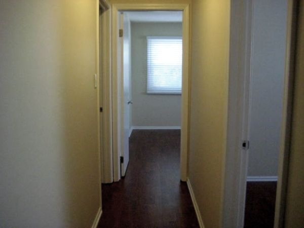 526 Inverrary Lane Deerfield, IL 60015 - Photo 6 of 7 a view of a hallway with wooden floor