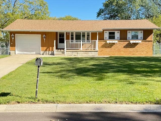 7809 Chase Street Merrillville, IN 46410 - Photo 1 of 33 a backyard of a house with table and chairs