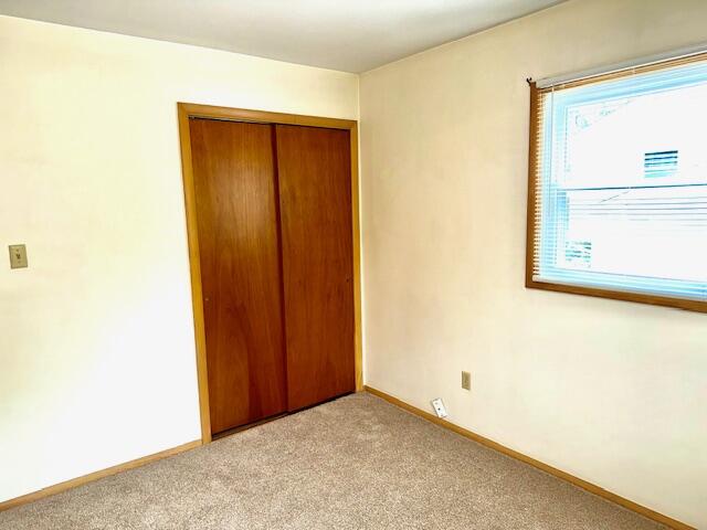 7809 Chase Street Merrillville, IN 46410 - Photo 15 of 33 a view of an empty room with a window