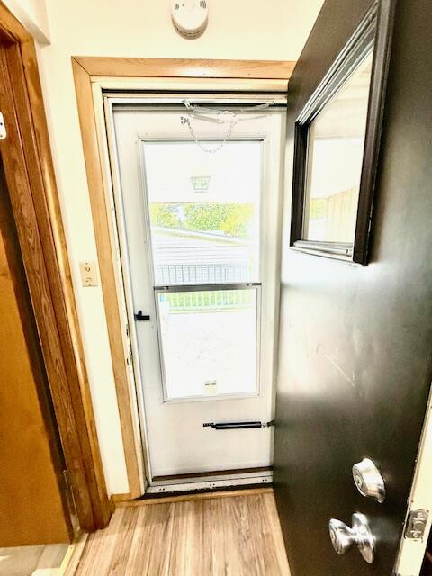 7809 Chase Street Merrillville, IN 46410 - Photo 21 of 33 a view of door with wooden floor
