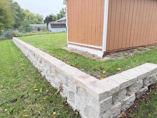 7809 Chase Street Merrillville, IN 46410 - Photo 26 of 33 a view of a backyard with garden