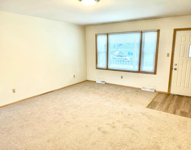 7809 Chase Street Merrillville, IN 46410 - Photo 6 of 33 a view of an empty room