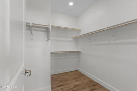 a view of an empty walk in closet