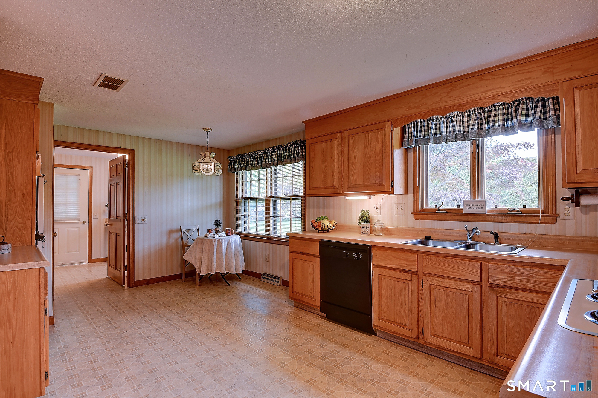 80 Grist Mill Road Wethersfield, CT 06109 - Photo 19 of 40 a large kitchen with a large window and counter space