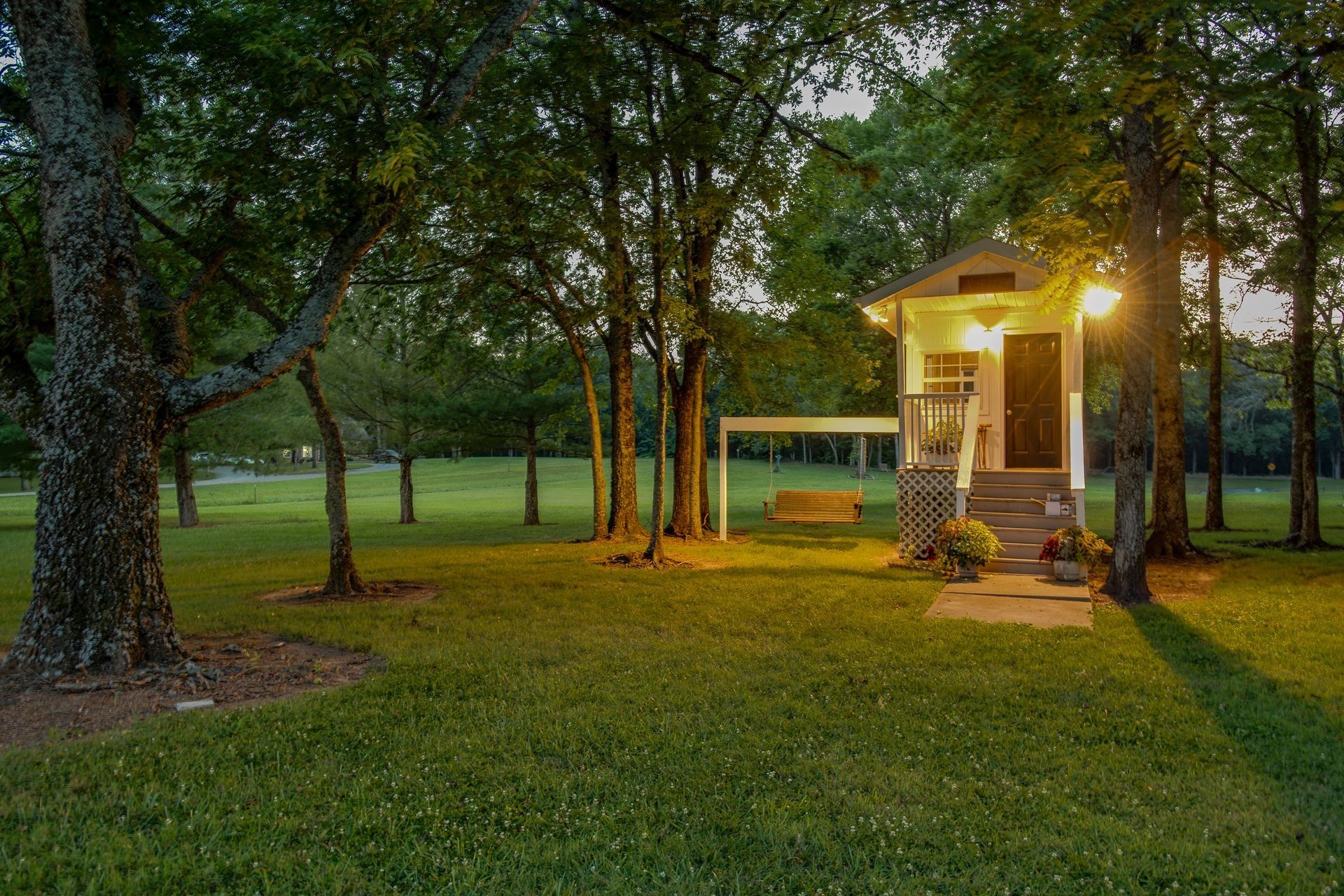 8712 Link Road Christiana, TN 37037 - Photo 58 of 65 a big yard with trees in front of it