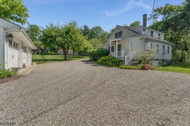 11 New Street Mendham, NJ 07945 - Photo 30 of 35 a view of a house with a yard
