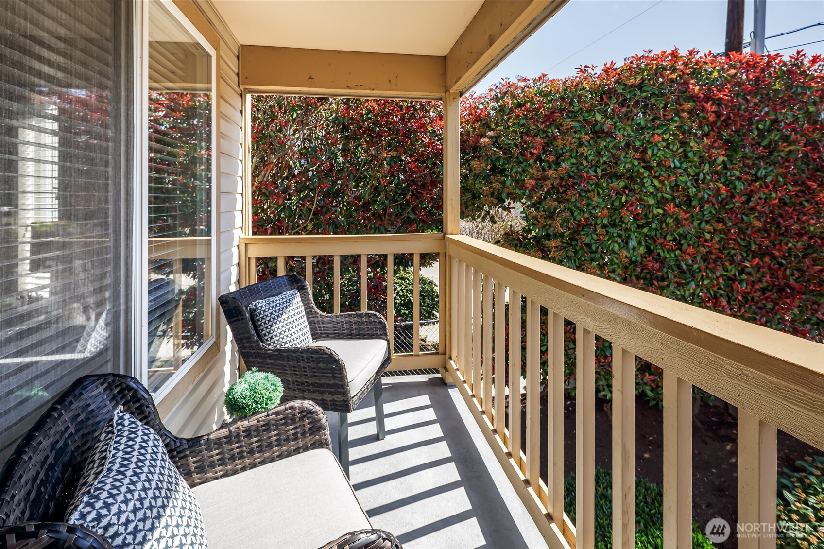 610 Glen Street, Unit 3 Edmonds, WA 98020 - Photo 11 of 19 a view of balcony with wooden floor and outdoor seating