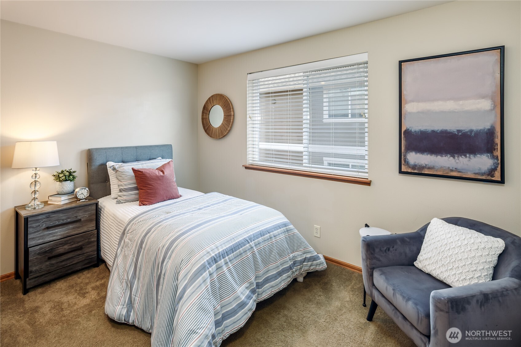 610 Glen Street, Unit 3 Edmonds, WA 98020 - Photo 17 of 19 a bedroom with a bed and a couch
