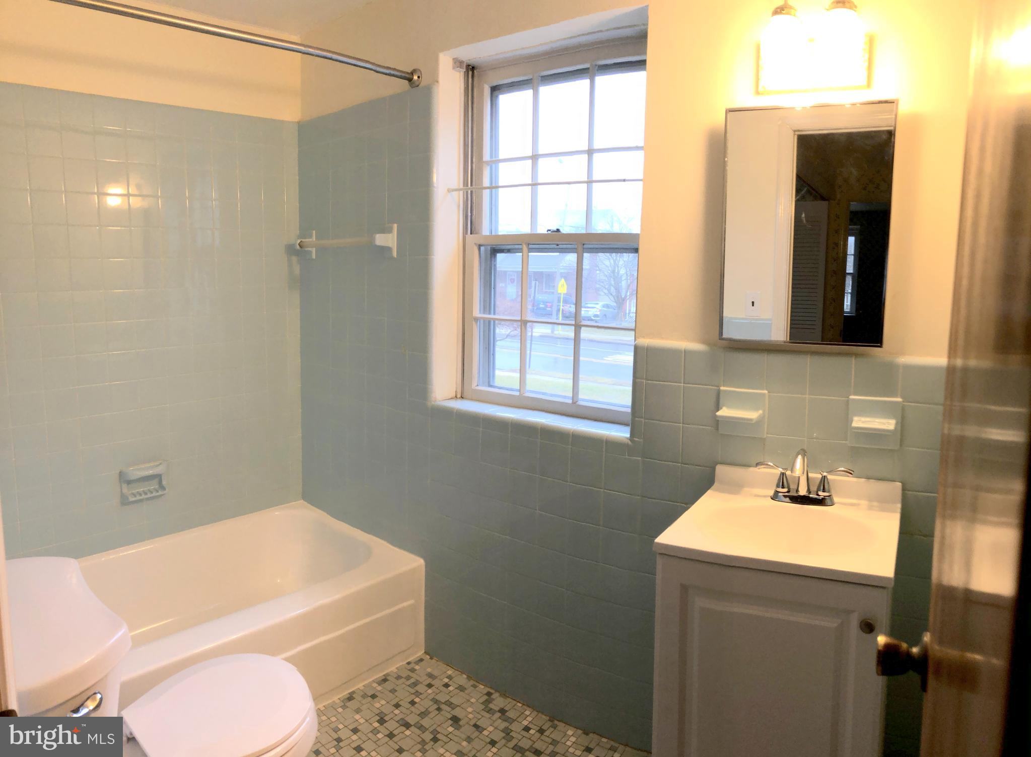 353 Powell Road Springfield, PA 19064 - Photo 12 of 25 Updated Downstairs Full Bathroom