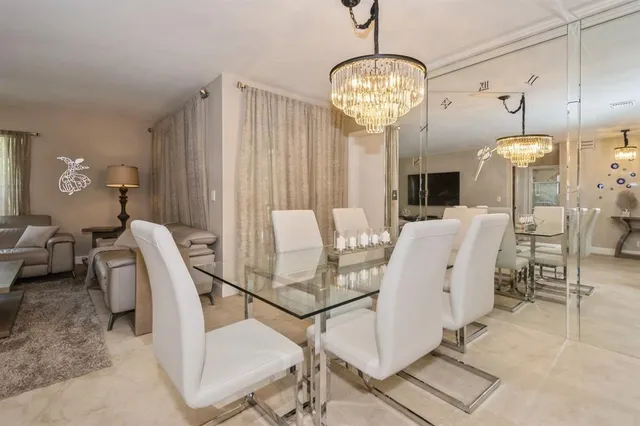 a view of a dining room with furniture