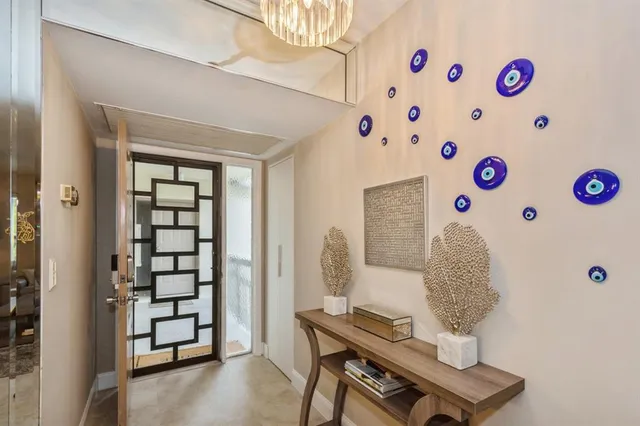 a view of a bedroom with window and wooden floor