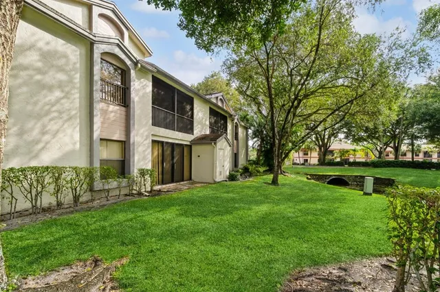 a brick building with a yard