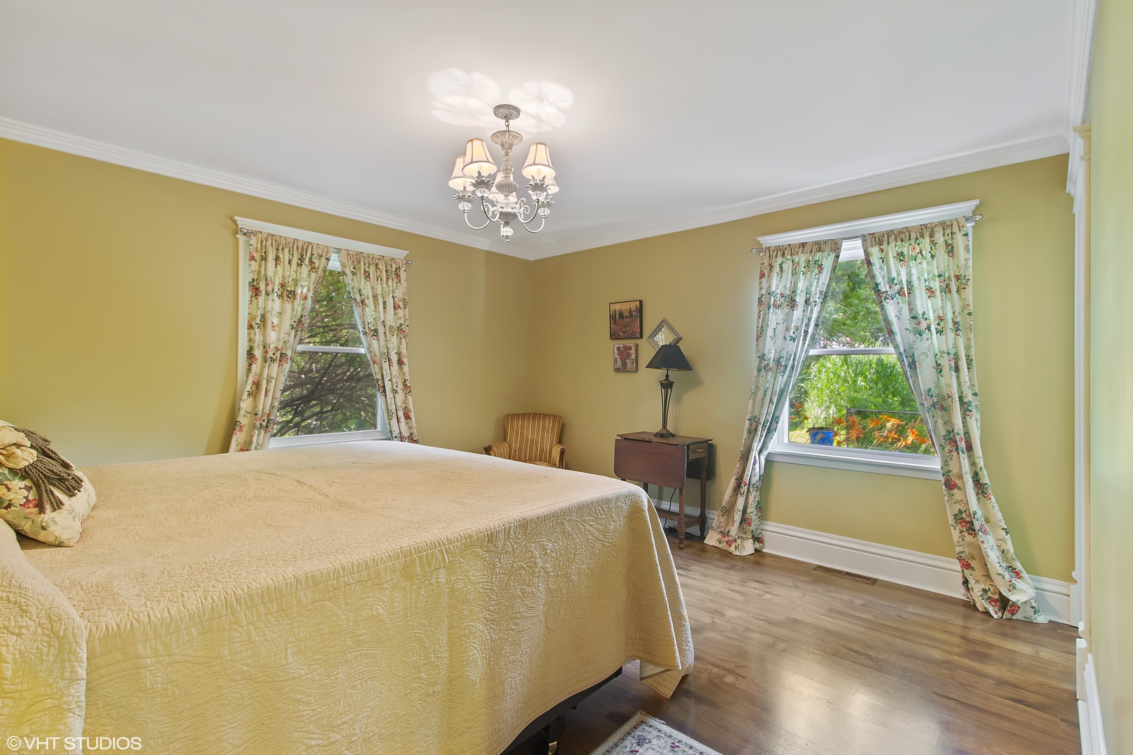1870 Scully Road Dwight, IL 60420 - Photo 15 of 29 a bedroom with a bed and a chandelier