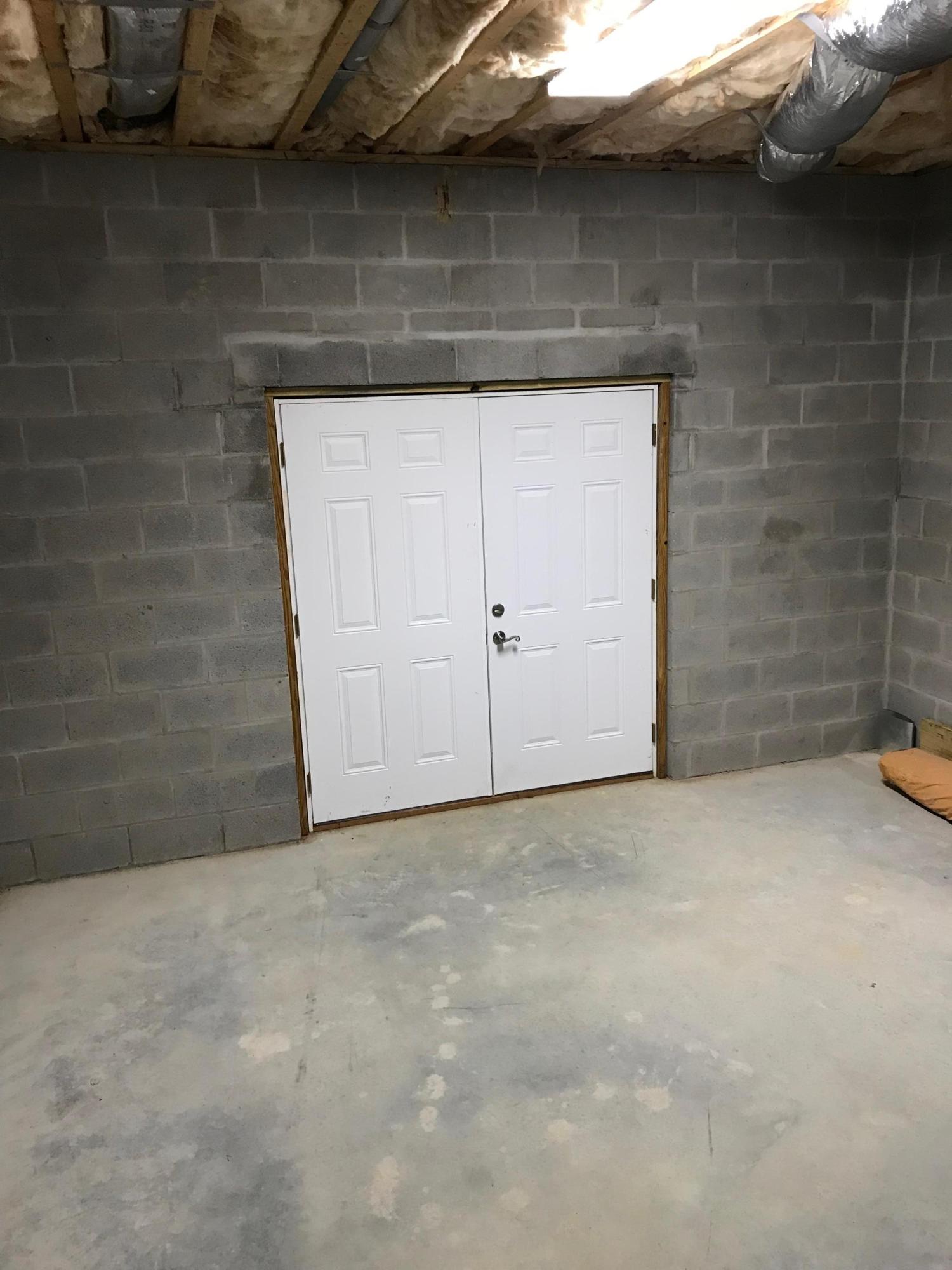111 Potato Farm Road Crossville, TN 38571 - Photo 27 of 40 Basement Doors & Storage Area
