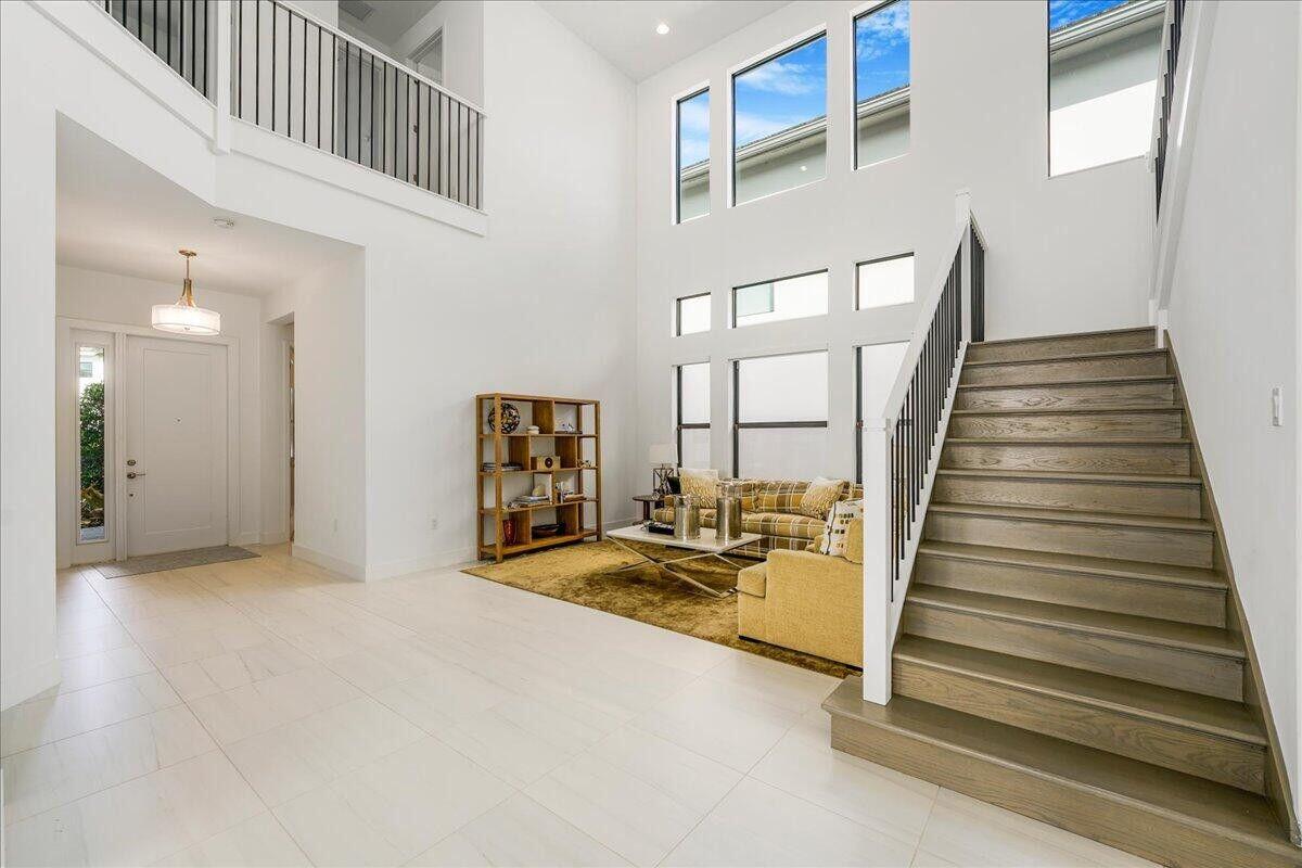 17496 Sparkling River Road Boca Raton, FL 33496 - Photo 11 of 36 a view of a livingroom with furniture and stairs