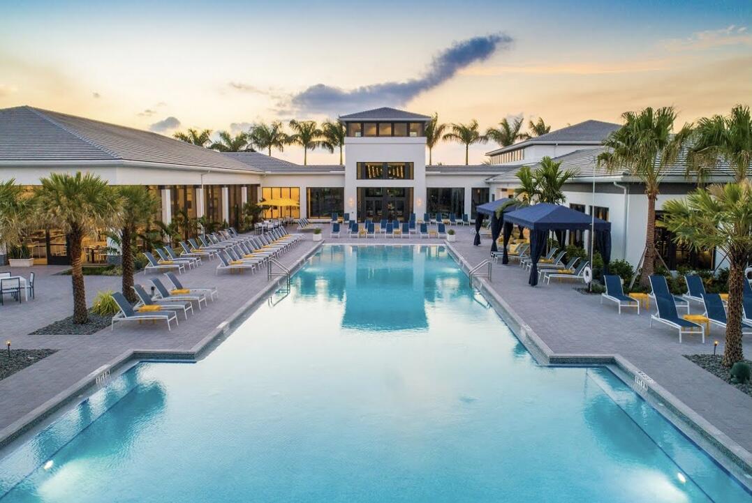 17496 Sparkling River Road Boca Raton, FL 33496 - Photo 31 of 36 an aerial view of a house with a swimming pool