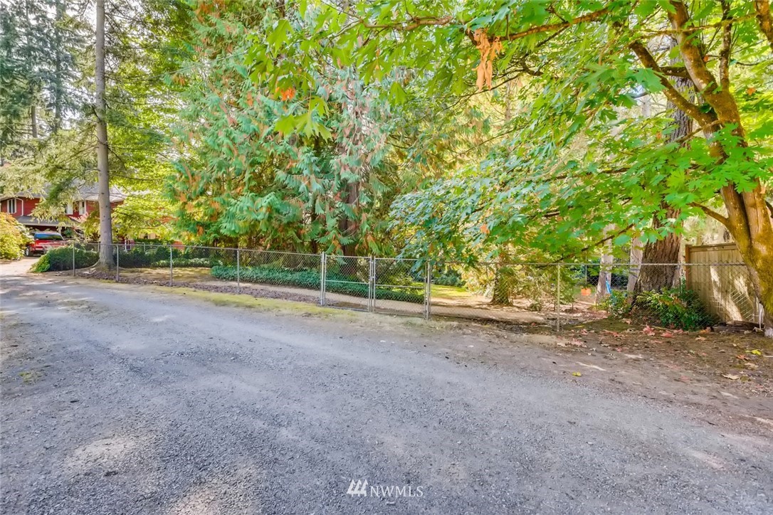 1823 224th Street Southwest Bothell, WA 98021 - Photo 11 of 27 a view of a road with a trees