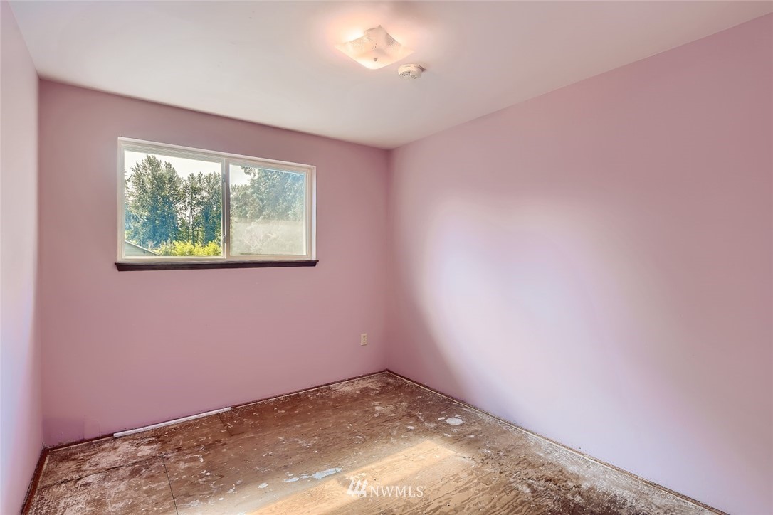 1823 224th Street Southwest Bothell, WA 98021 - Photo 21 of 27 an empty room with a window