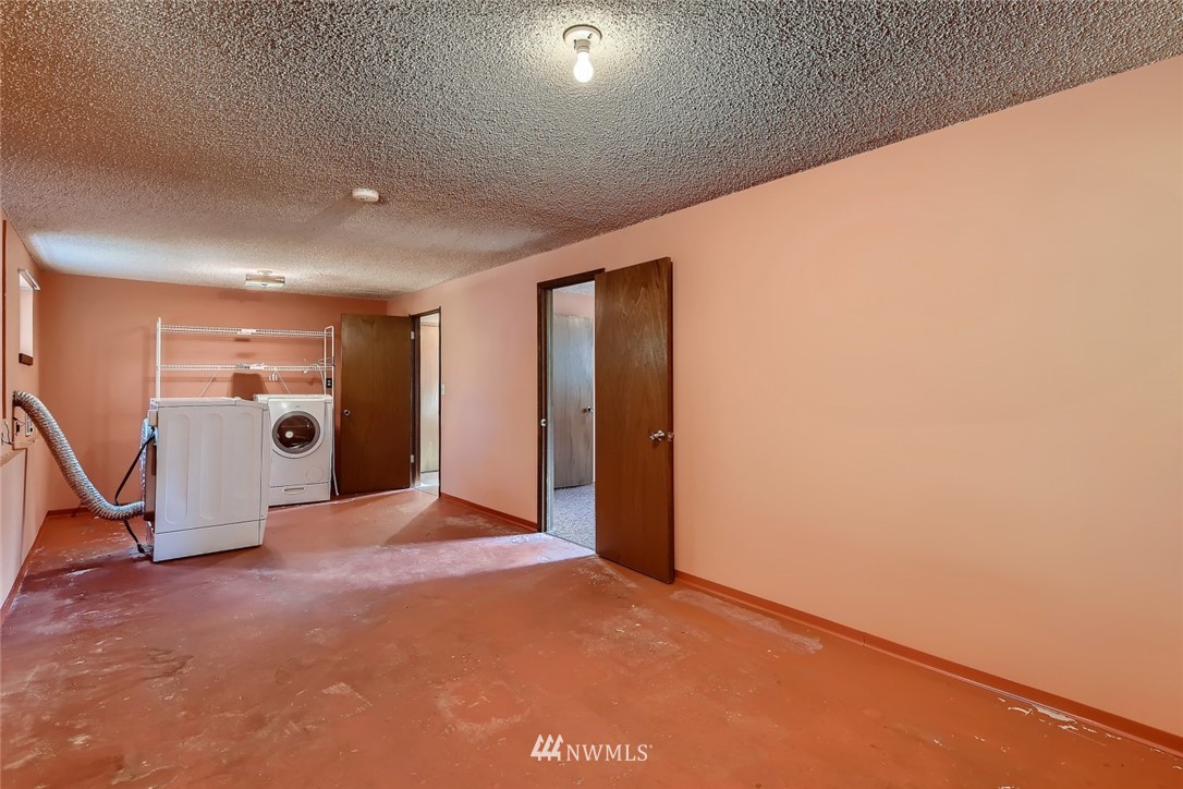 1823 224th Street Southwest Bothell, WA 98021 - Photo 26 of 27 a view of a livingroom with a staircase