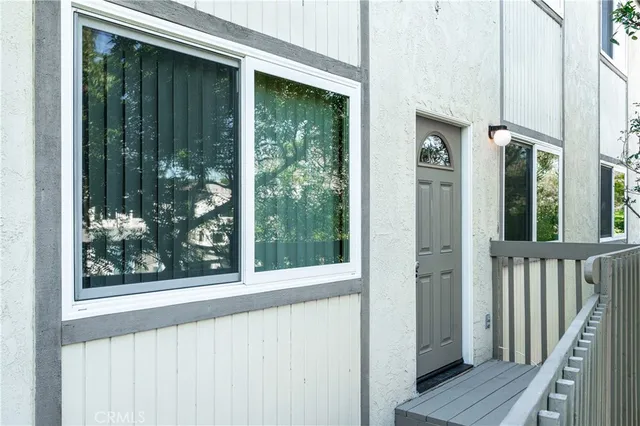 a view of a house with a porch