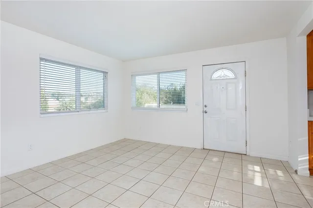 a view of an empty room and window