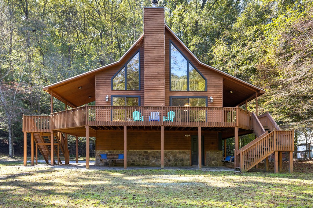 96 Holiday Court Ellijay, GA 30540 - Photo 6 of 51 a view of a house with a balcony