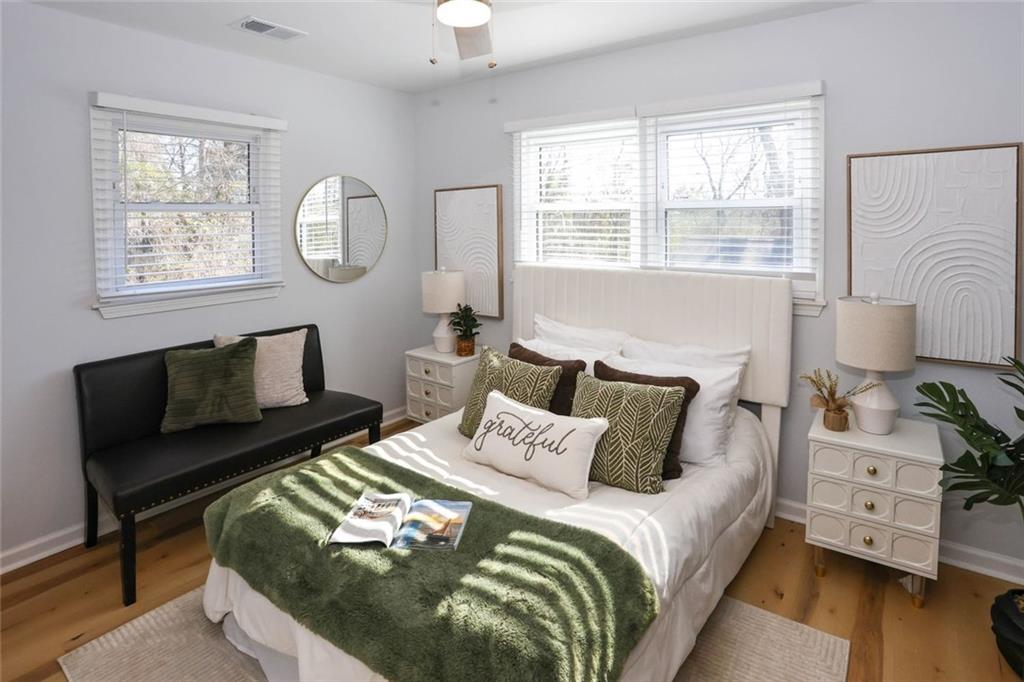 1745 Rockbridge Road Northwest Conyers, GA 30012 - Photo 29 of 46 a bedroom with furniture and a window