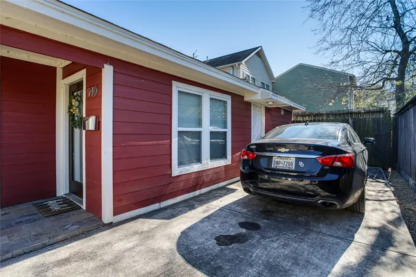 a car parked in front of a house