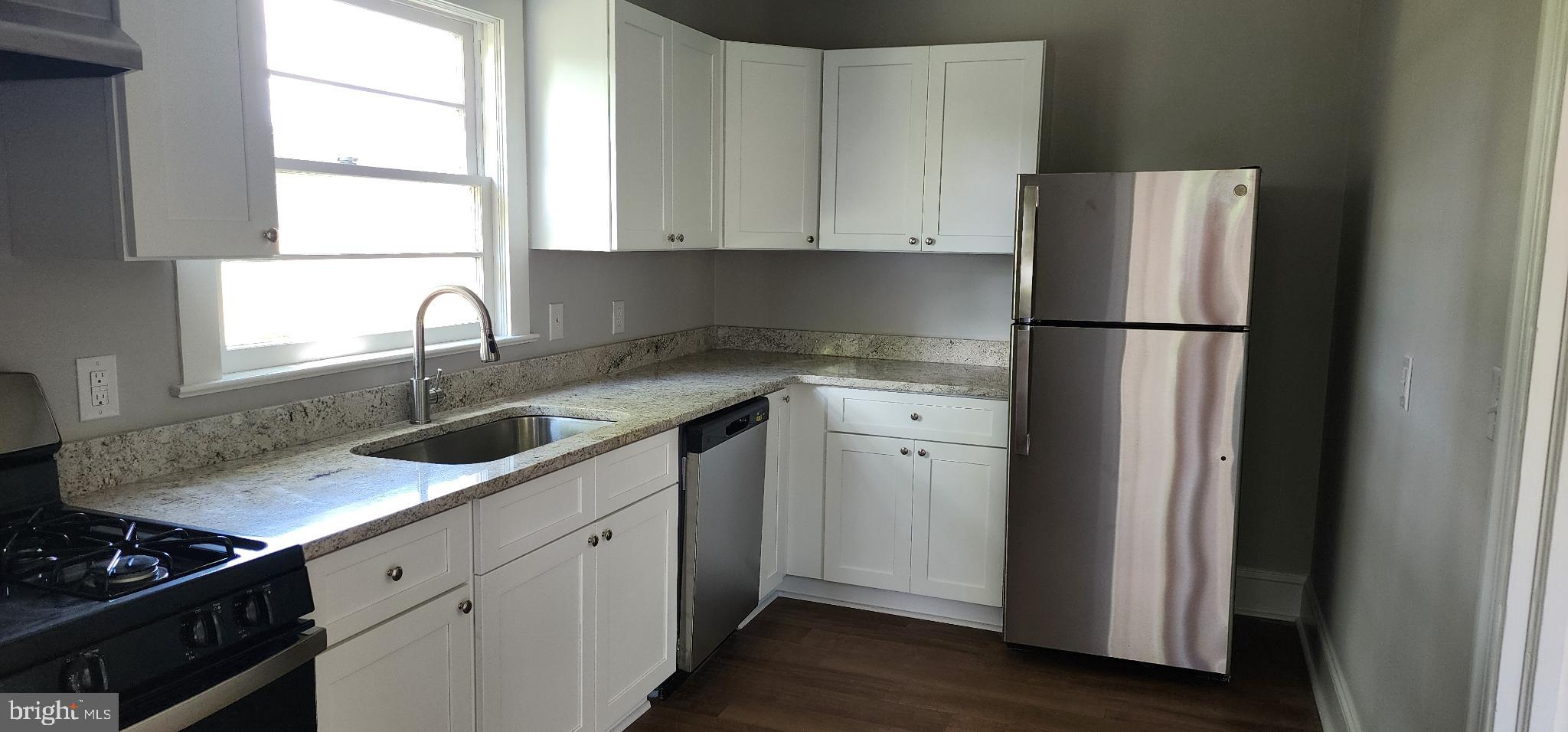 8432 Meadow Bridge Road Eden, MD 21822 - Photo 16 of 42 Modern kitchen with sleek finishes.