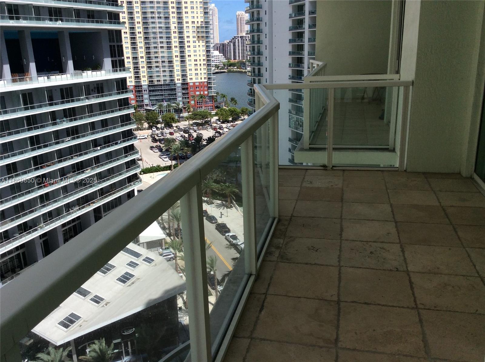 218 Southeast 14th Street, Unit 1508 Miami, FL 33131 - Photo 10 of 12 a view of balcony with wooden floor and seating space