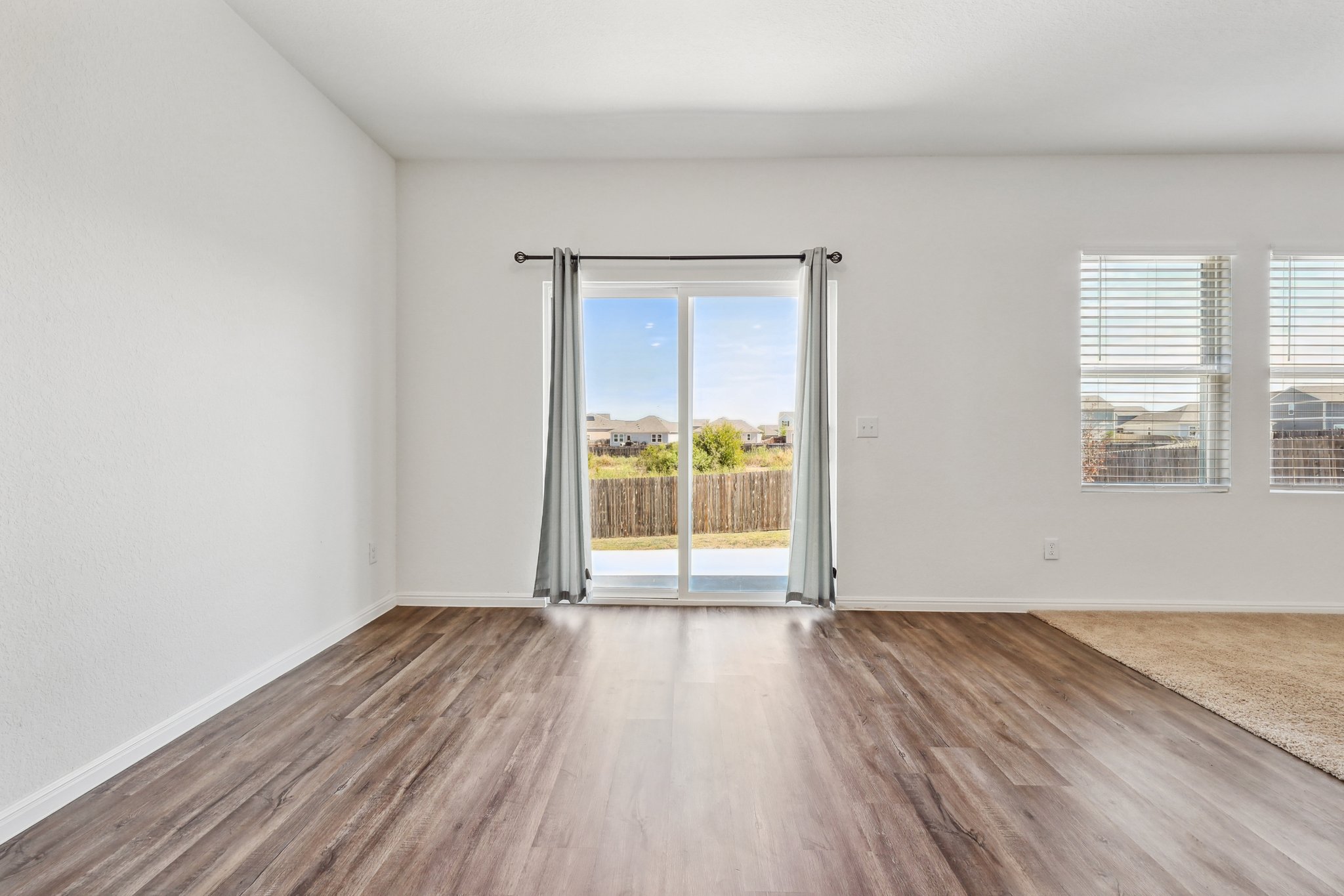 14105 Jeannette Rankin Rd Manor Manor, TX 78653 - Photo 10 of 28 Dining area with plenty of natural light and wood finished floors