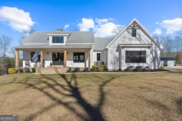 a view of a living room and dining room