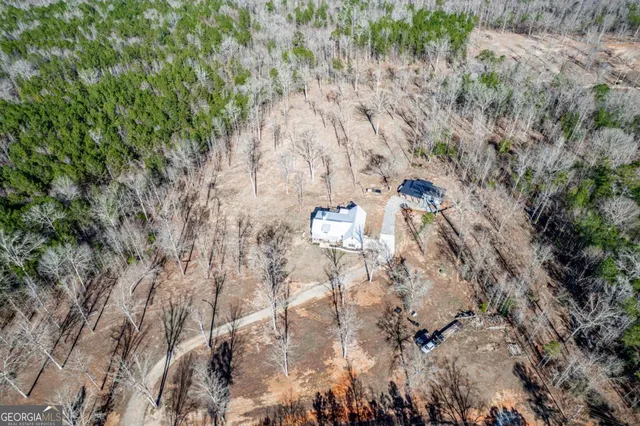 a view of a dry yard with wooden floor