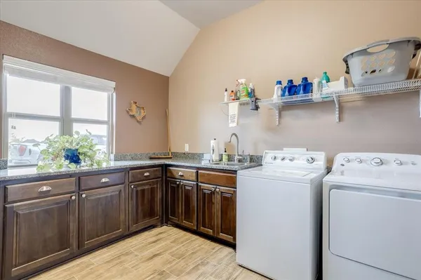 a view of kitchen and sink
