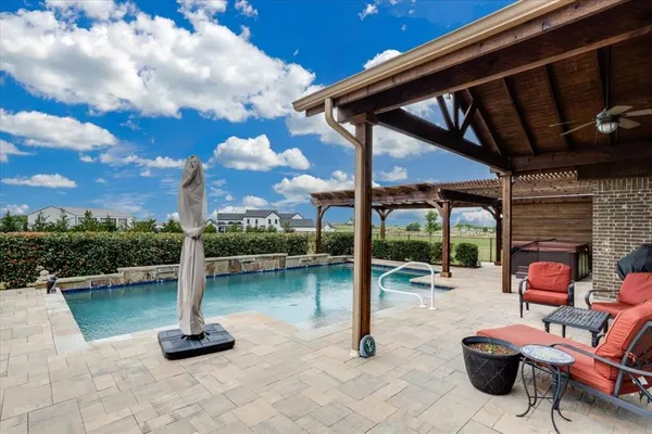 a view of a terrace with sitting area