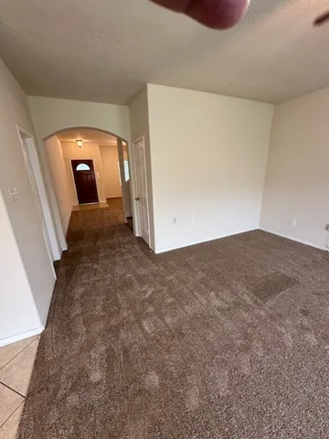 a view of a livingroom with wooden floor