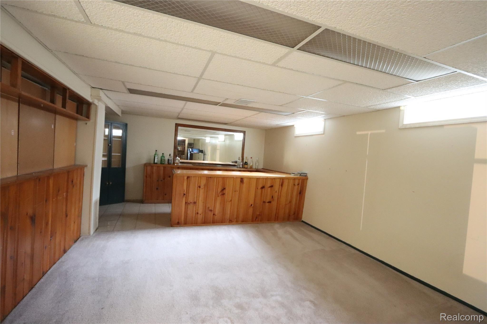 2827 Bembridge Road Royal Oak, MI 48073 - Photo 29 of 38 IMG_8521 REC ROOM WITH BAR.JPG