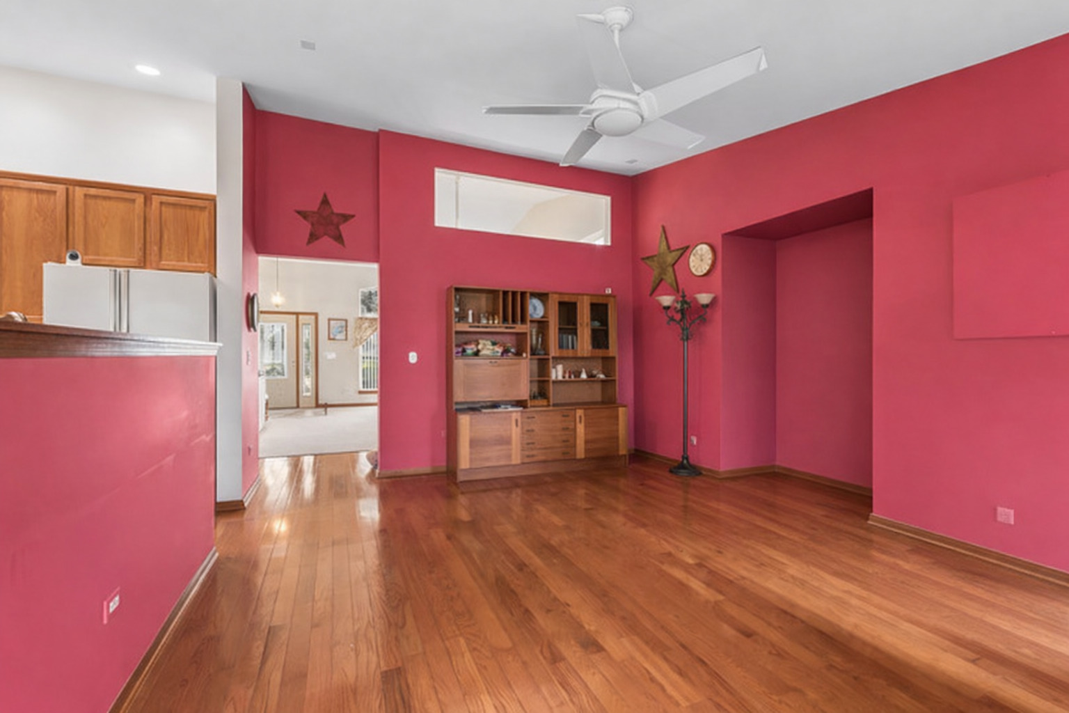 1921 Baldwin Way Bolingbrook, IL 60490 - Photo 16 of 20 a view of a room with wooden floor and furniture