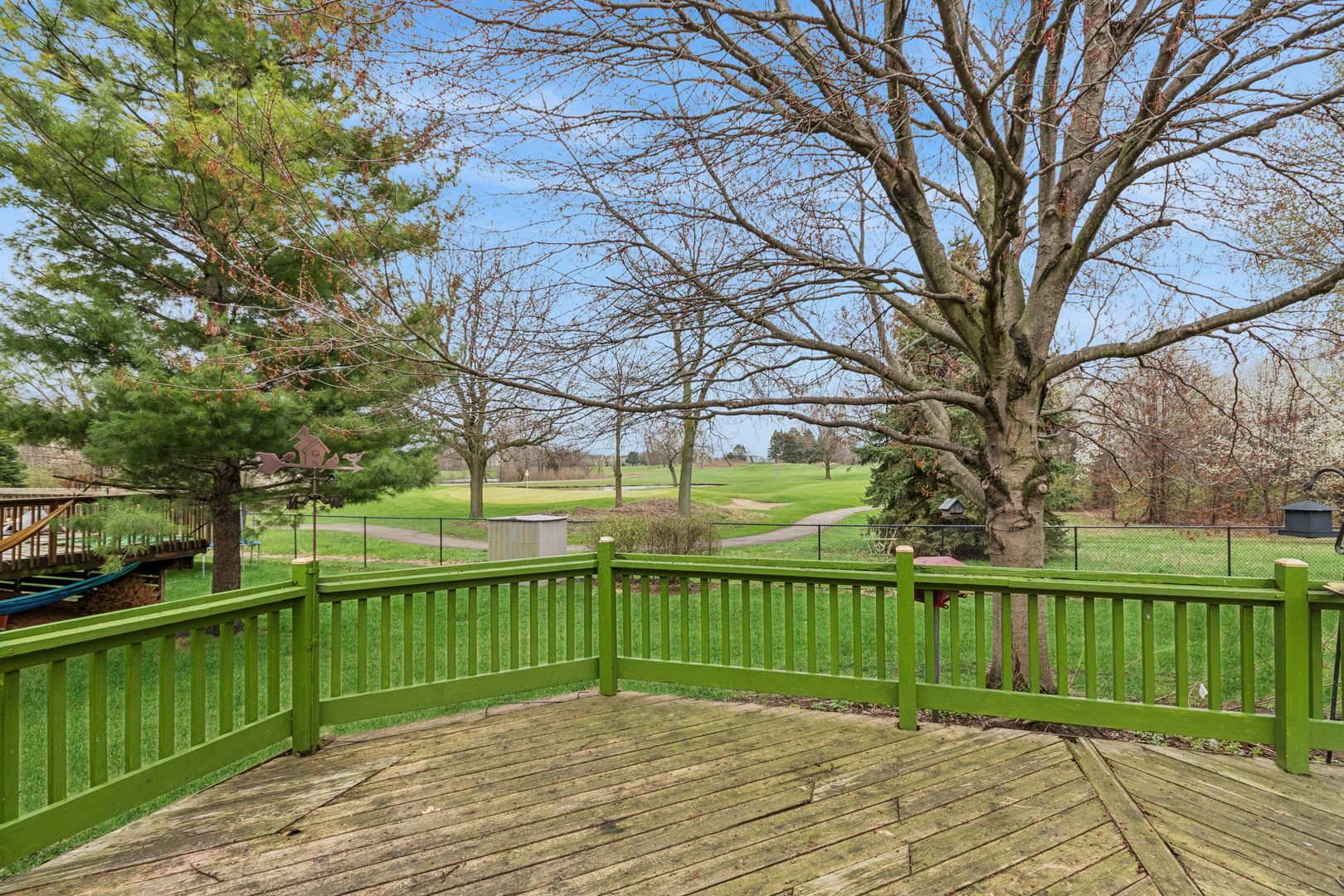 1921 Baldwin Way Bolingbrook, IL 60490 - Photo 19 of 20 a view of a deck with a yard