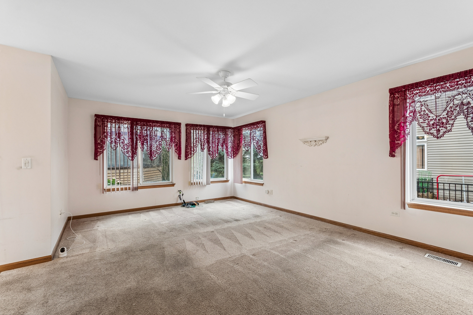 1921 Baldwin Way Bolingbrook, IL 60490 - Photo 9 of 20 a view of an empty room with a window