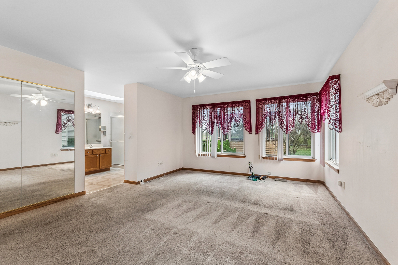 1921 Baldwin Way Bolingbrook, IL 60490 - Photo 10 of 20 a view of an empty room with a window