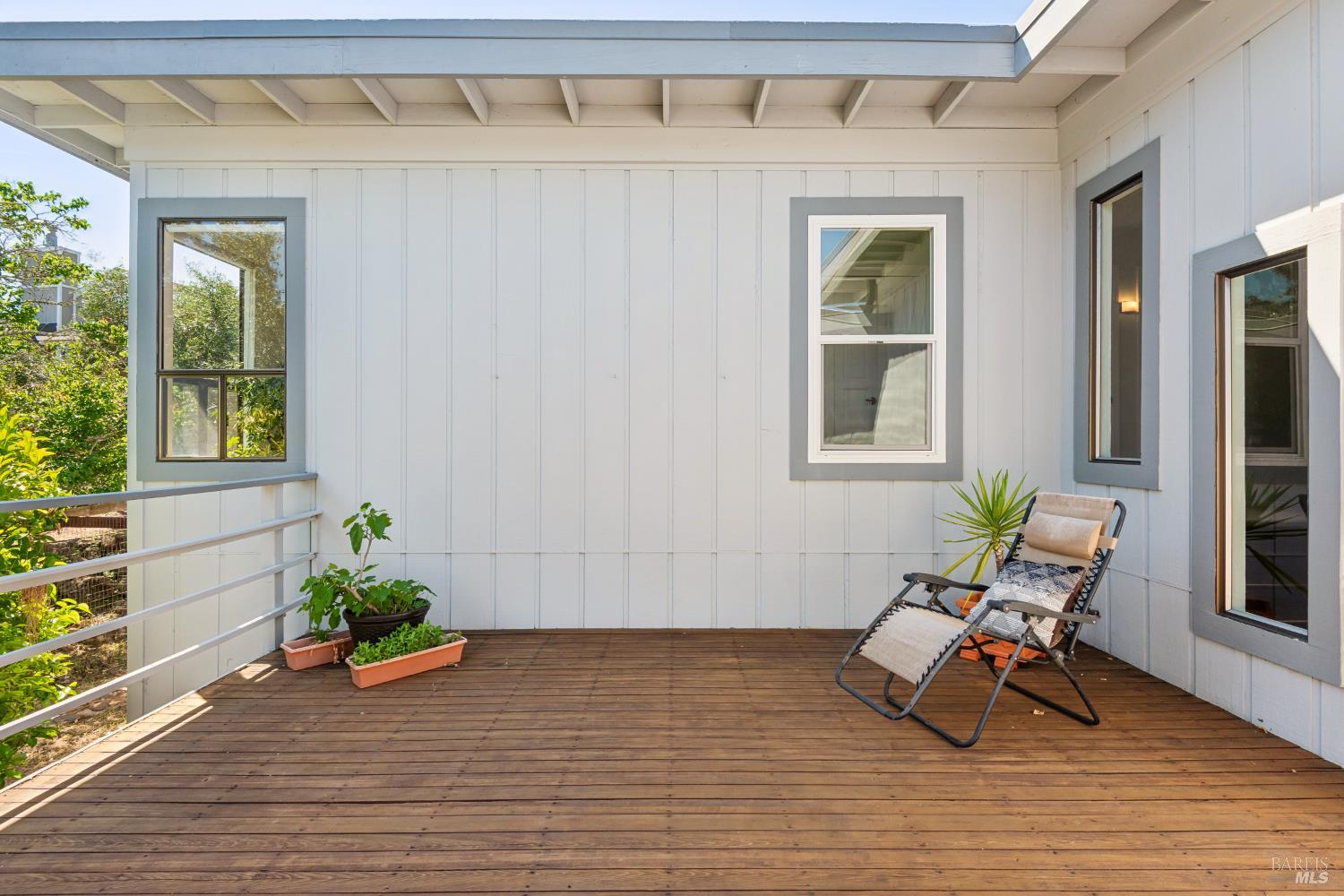 1475 Los Olivos Road Santa Rosa, CA 95404 - Photo 16 of 51 a wooden bench sitting in front of a door