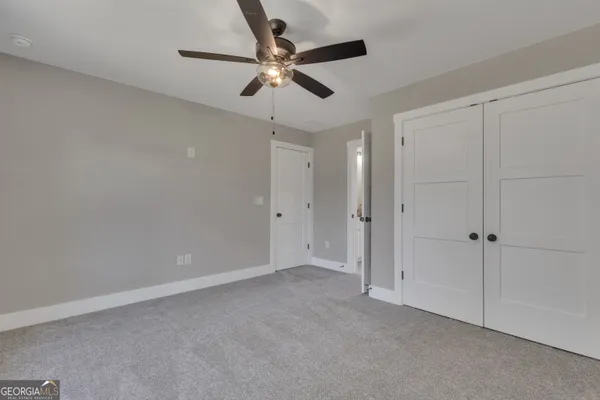 a view of a ceiling fan in a room