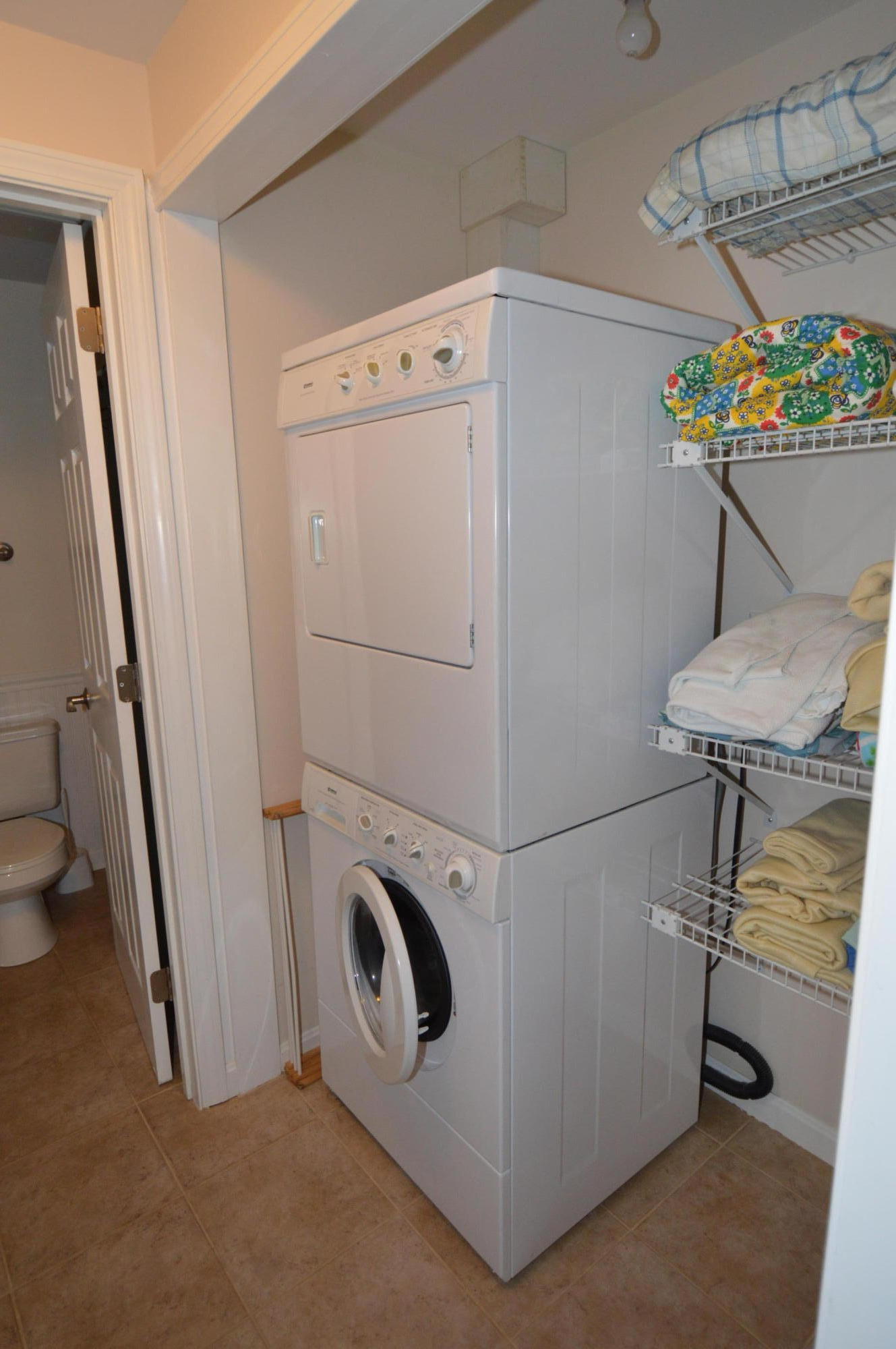 174 Lowell Road, Unit T30 Mashpee, MA 02649 - Photo 15 of 19 a utility room with dryer and washer